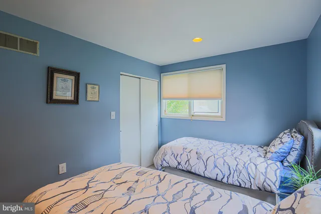 a view of a storage & utility room with washer and dryer