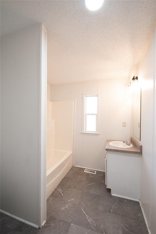 128 Fob Lane Frierson, LA 71027 - Photo 16 of 22 a view of a kitchen cabinets and a window