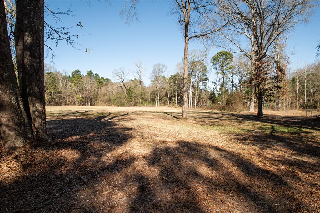 128 Fob Lane Frierson, LA 71027 - Photo 2 of 22 a view of dirt field with trees