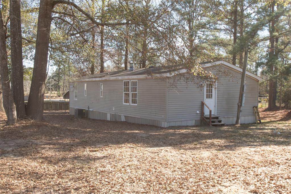 128 Fob Lane Frierson, LA 71027 - Photo 3 of 22 a view of a house with a yard covered in snow