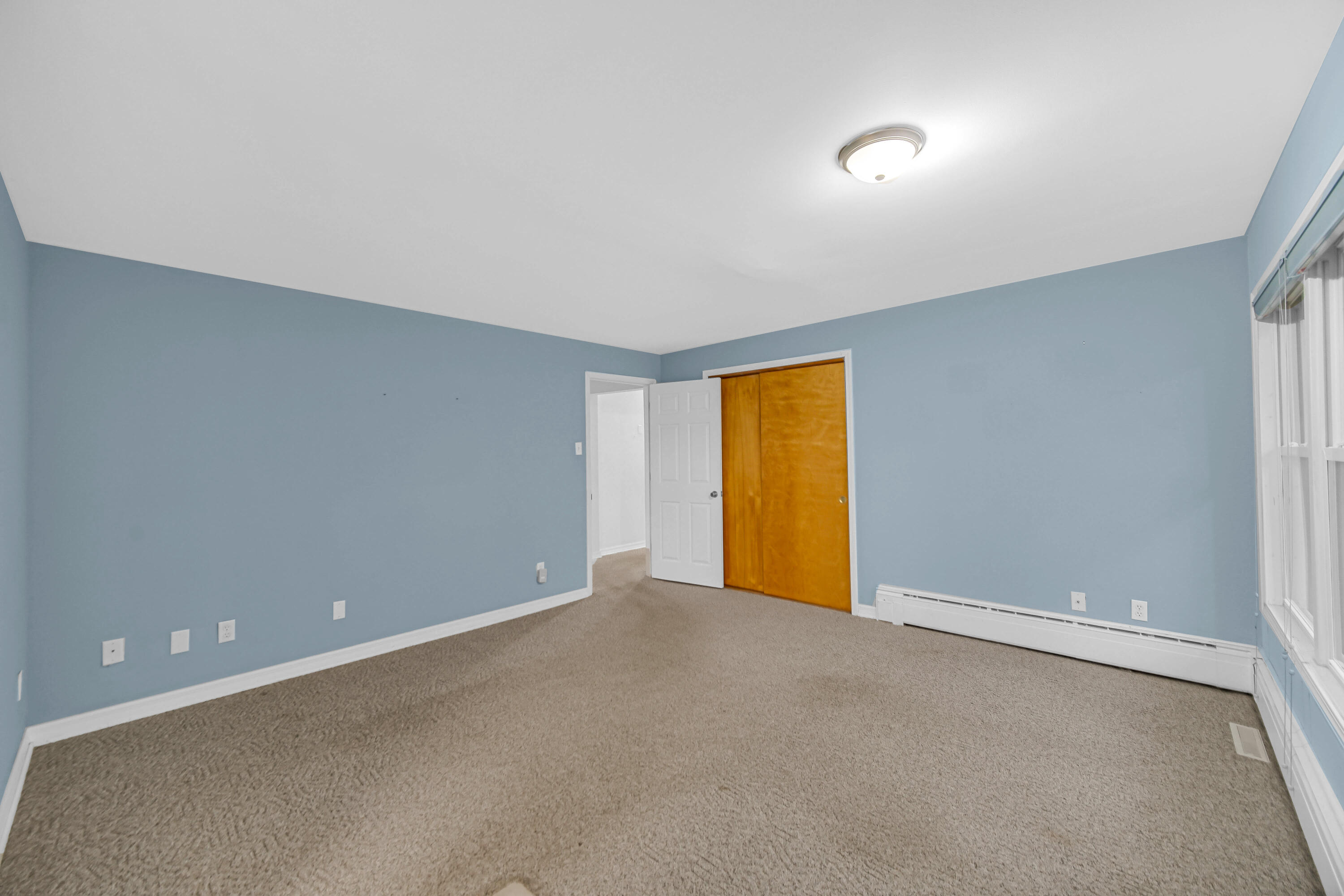 204 North Main Street Kouts, IN 46347 - Photo 18 of 28 a view of an empty room with a window
