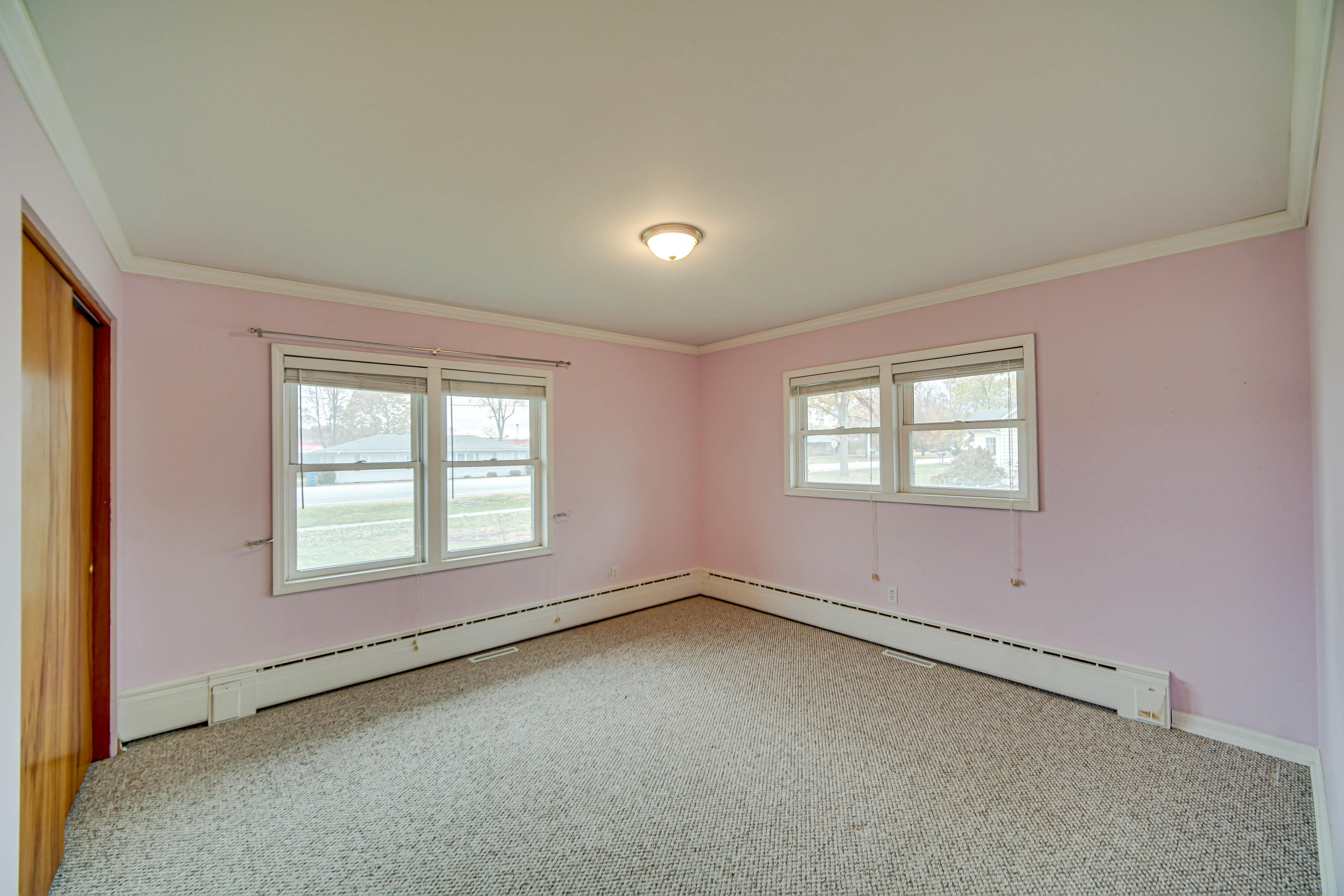 204 North Main Street Kouts, IN 46347 - Photo 20 of 28 an empty room with a window