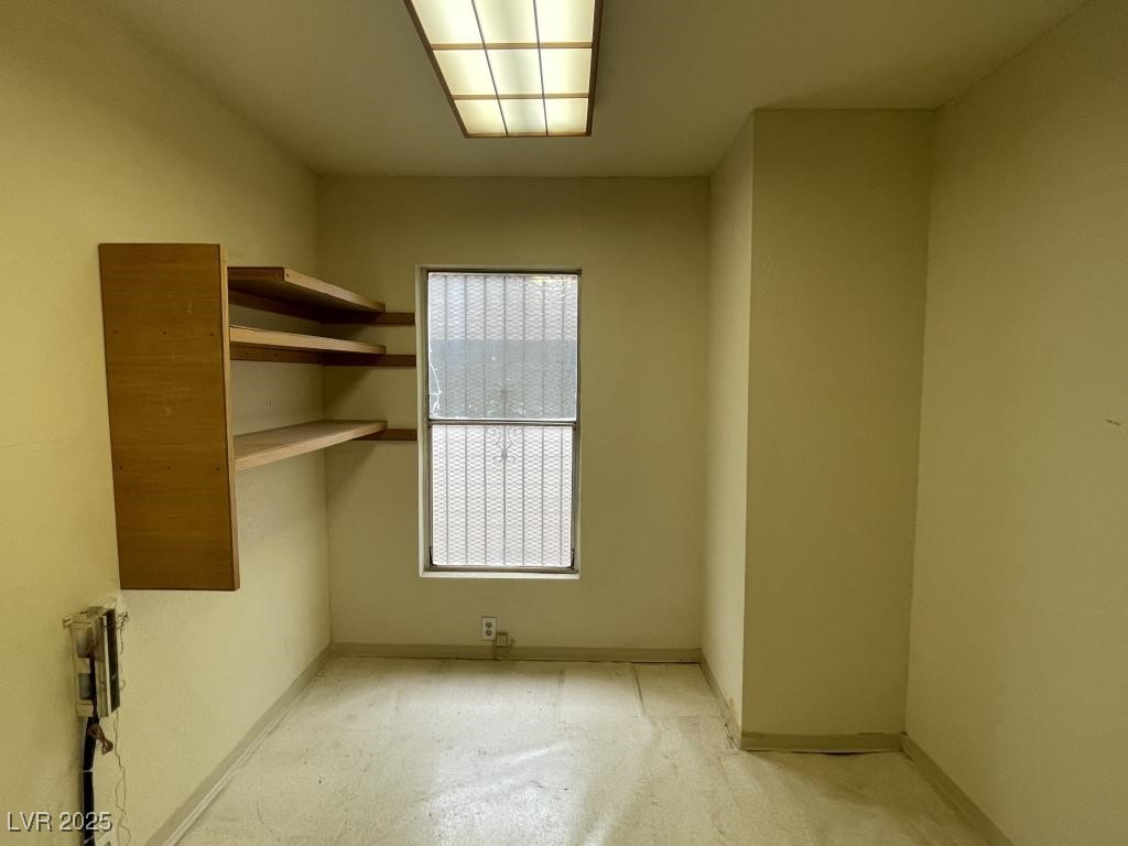 3530 North Pecos Road Las Vegas, NV 89115 - Photo 27 of 46 Empty room featuring baseboards