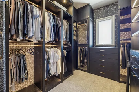 a bedroom with furniture and a couch