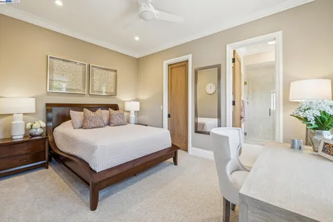 a bedroom with a bed and furniture