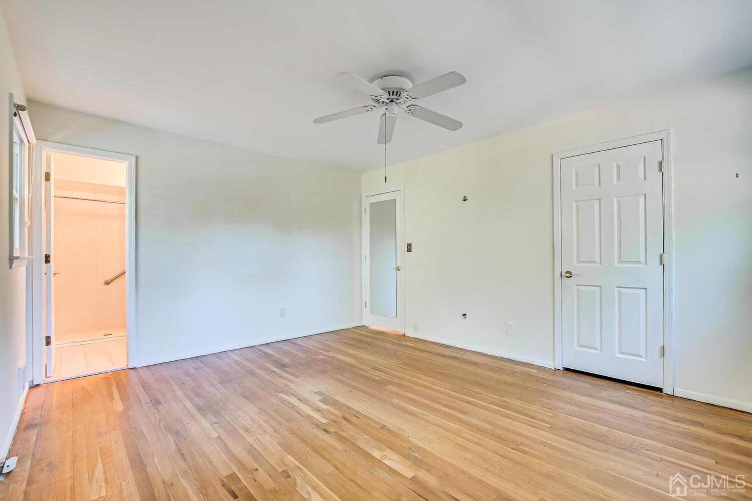 16 Bradford Road Edison, NJ 08820 - Photo 22 of 39 a view of empty room with wooden floor