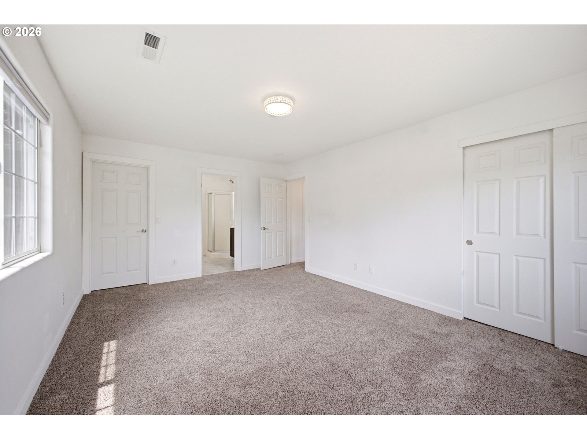 17156 Northeast Flanders Way Portland, OR 97230 - Photo 25 of 38 Owner's Suite Bedroom