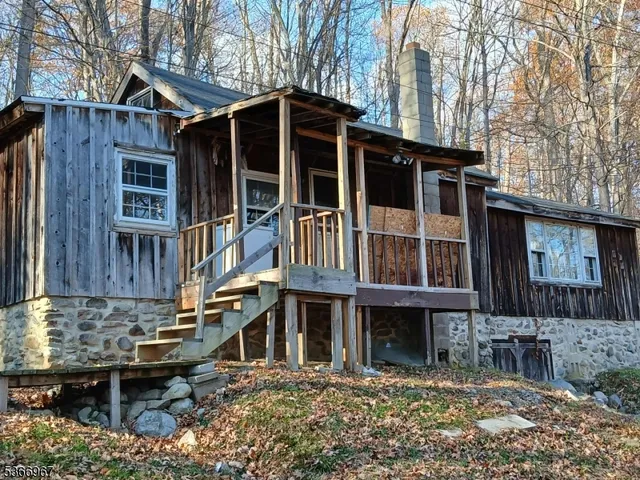 a front view of a house with a porch