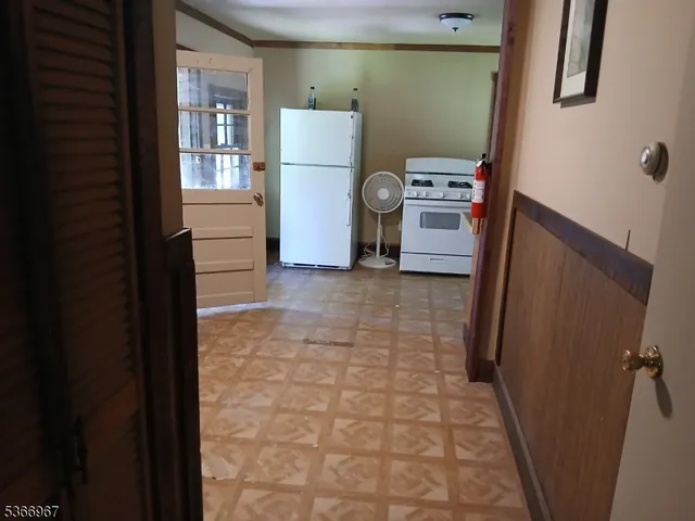 a view of a storage & utility room with washer and dryer