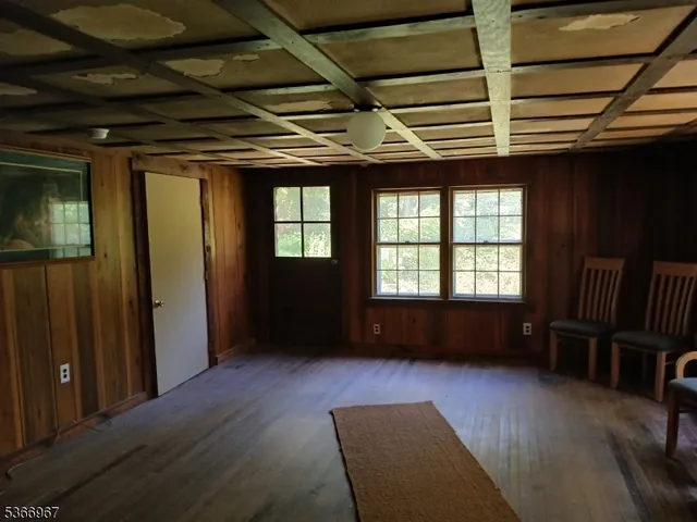 a view of livingroom with furniture and windows