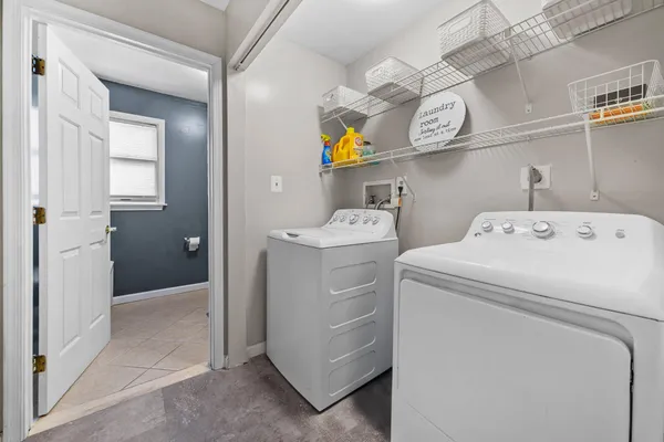 a utility room with dryer and washer