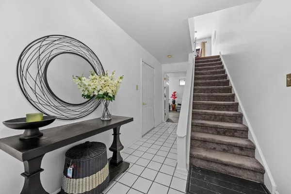 a view of an entryway with sitting space