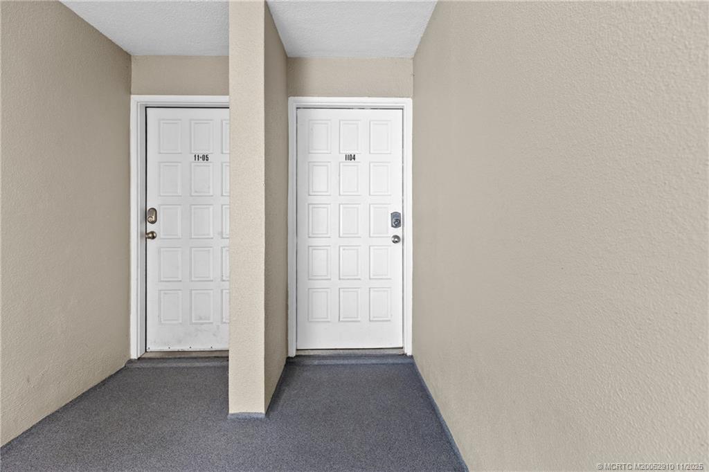 379 Northeast Tradewind Lane, Unit 1104 Stuart, FL 34996 - Photo 25 of 30 a view of a hallway