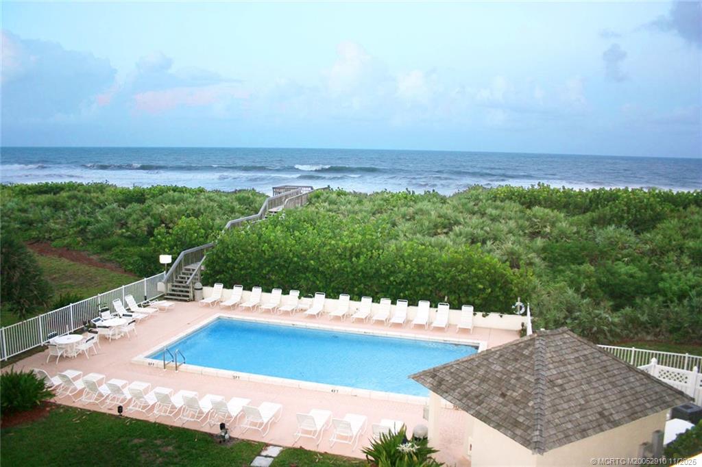 379 Northeast Tradewind Lane, Unit 1104 Stuart, FL 34996 - Photo 29 of 30 a view of a back yard of a house
