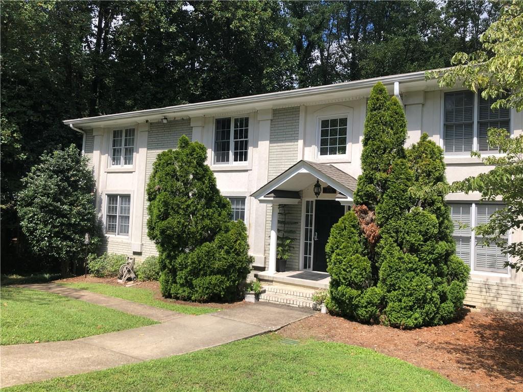 Top Right Condominium For Sale, 4 units total in building. 4 buildings in entire complex located in a wooded area off of Scott Blvd in Decatur.