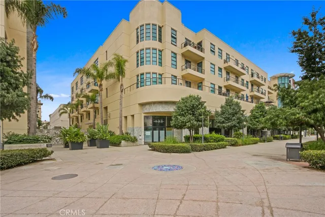 a view of a building with a yard