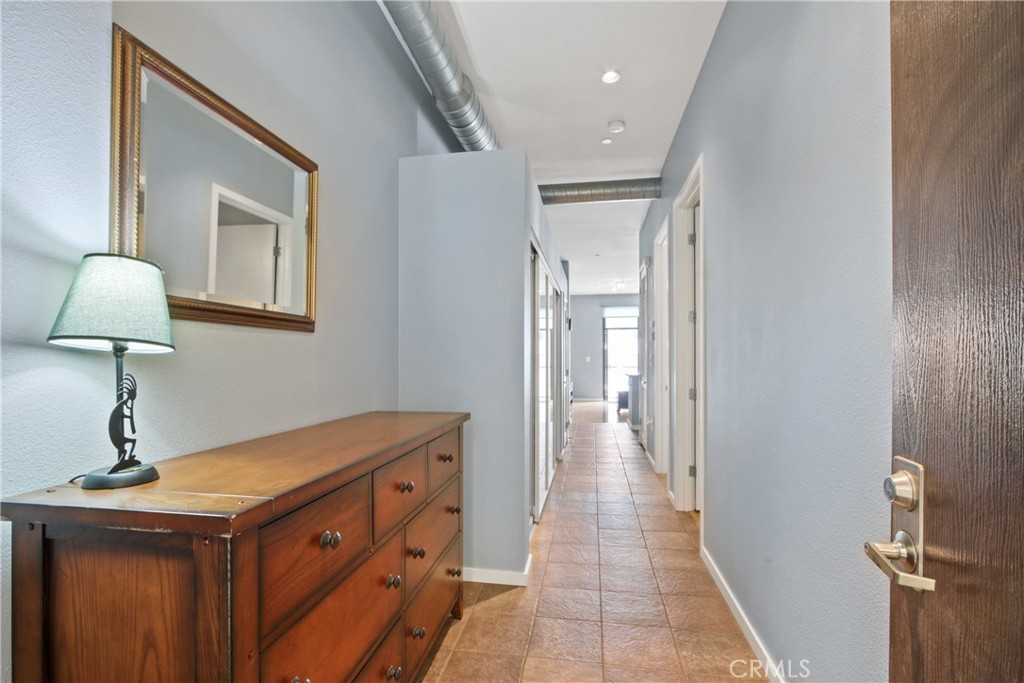 133 The Promenade North, Unit 330 Long Beach, CA 90802 - Photo 3 of 17 a kitchen with a sink and cabinets