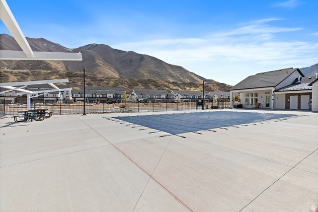 4735 Alder Drive, Unit F101 Mapleton, UT 84664 - Photo 28 of 30 Community pool with a mountain view, a residential view, and a patio