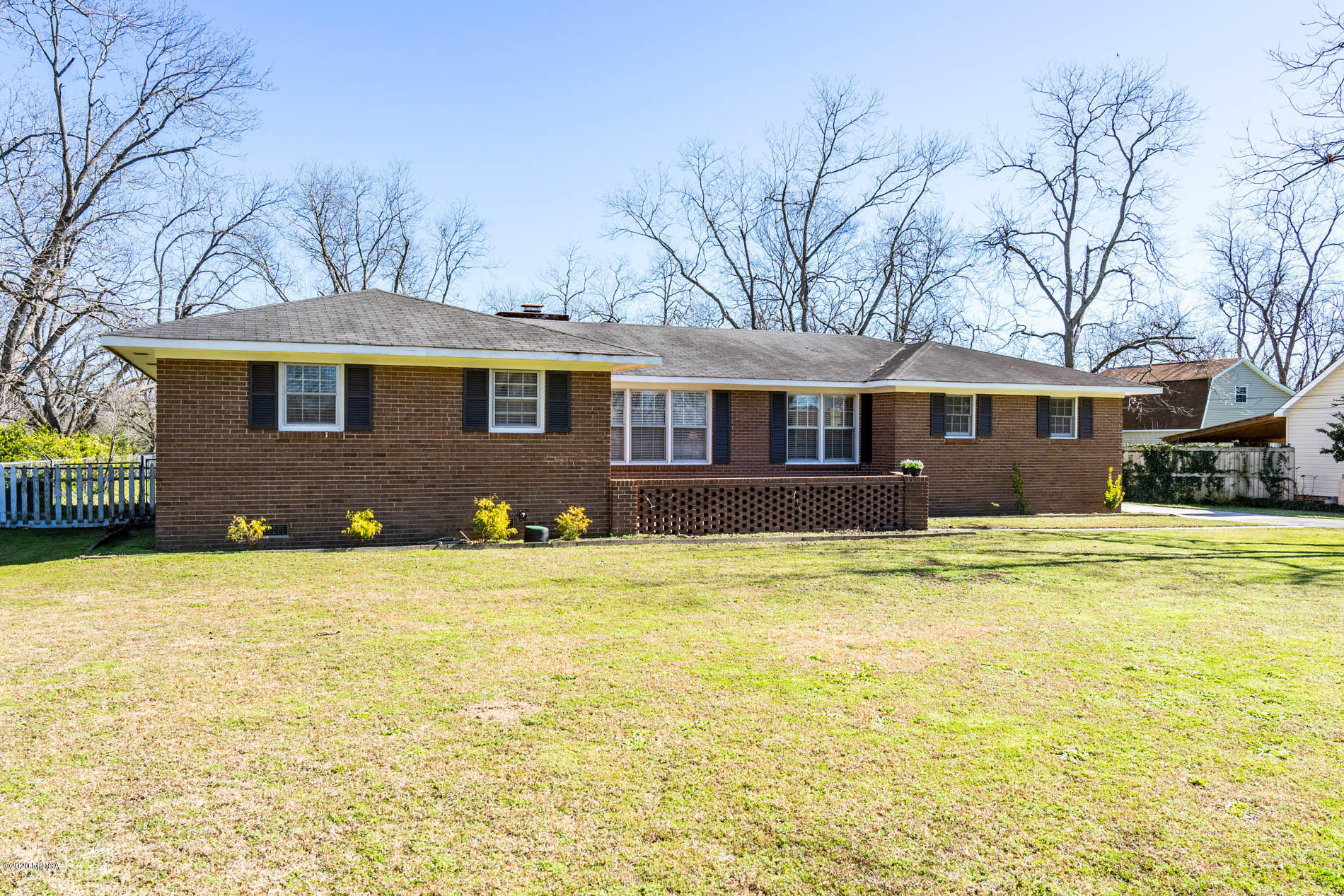 5720 School Road Macon, GA 31216 - Photo 2 of 31 a front view of a house with a lake view