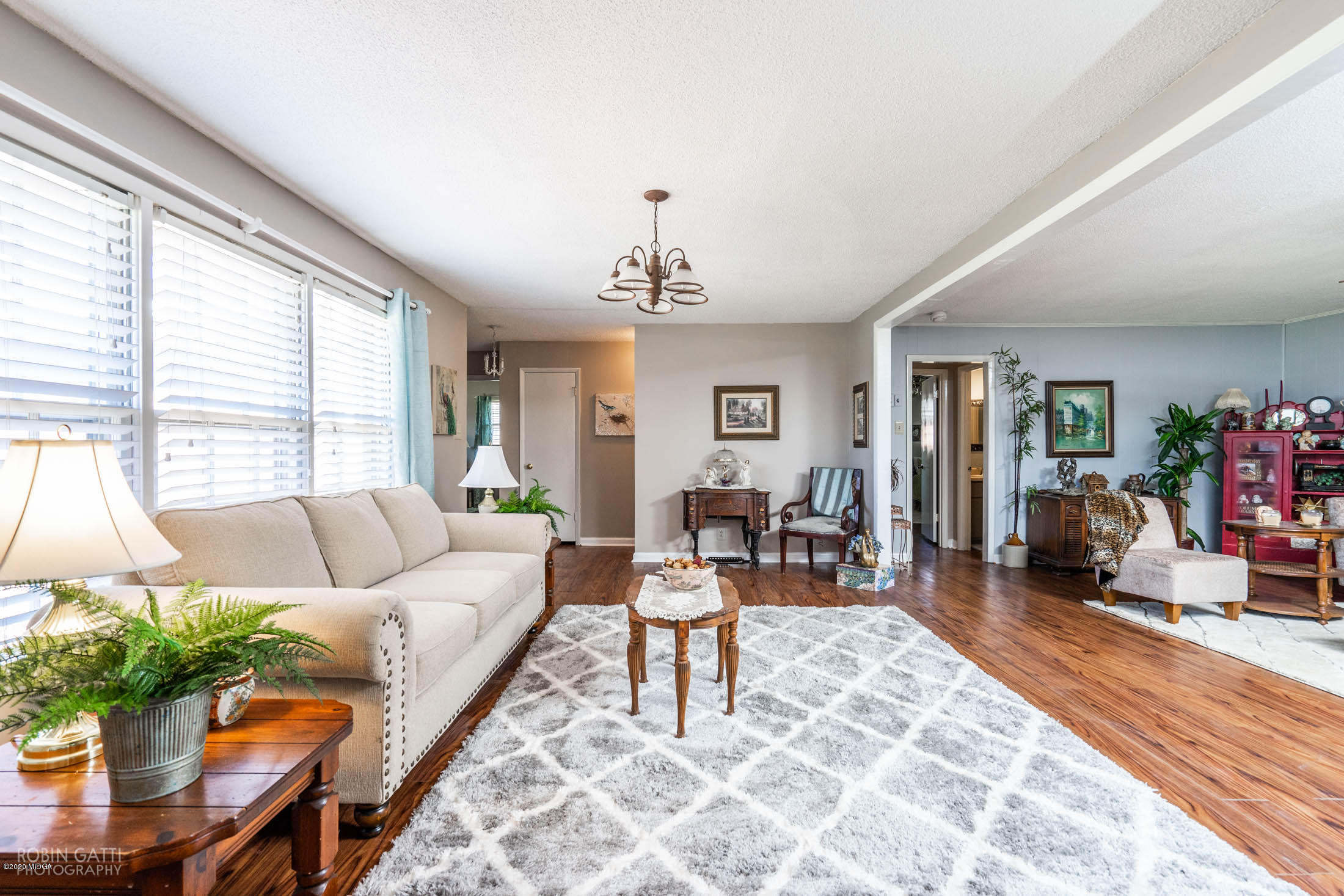 5720 School Road Macon, GA 31216 - Photo 11 of 31 a living room with furniture and a large window