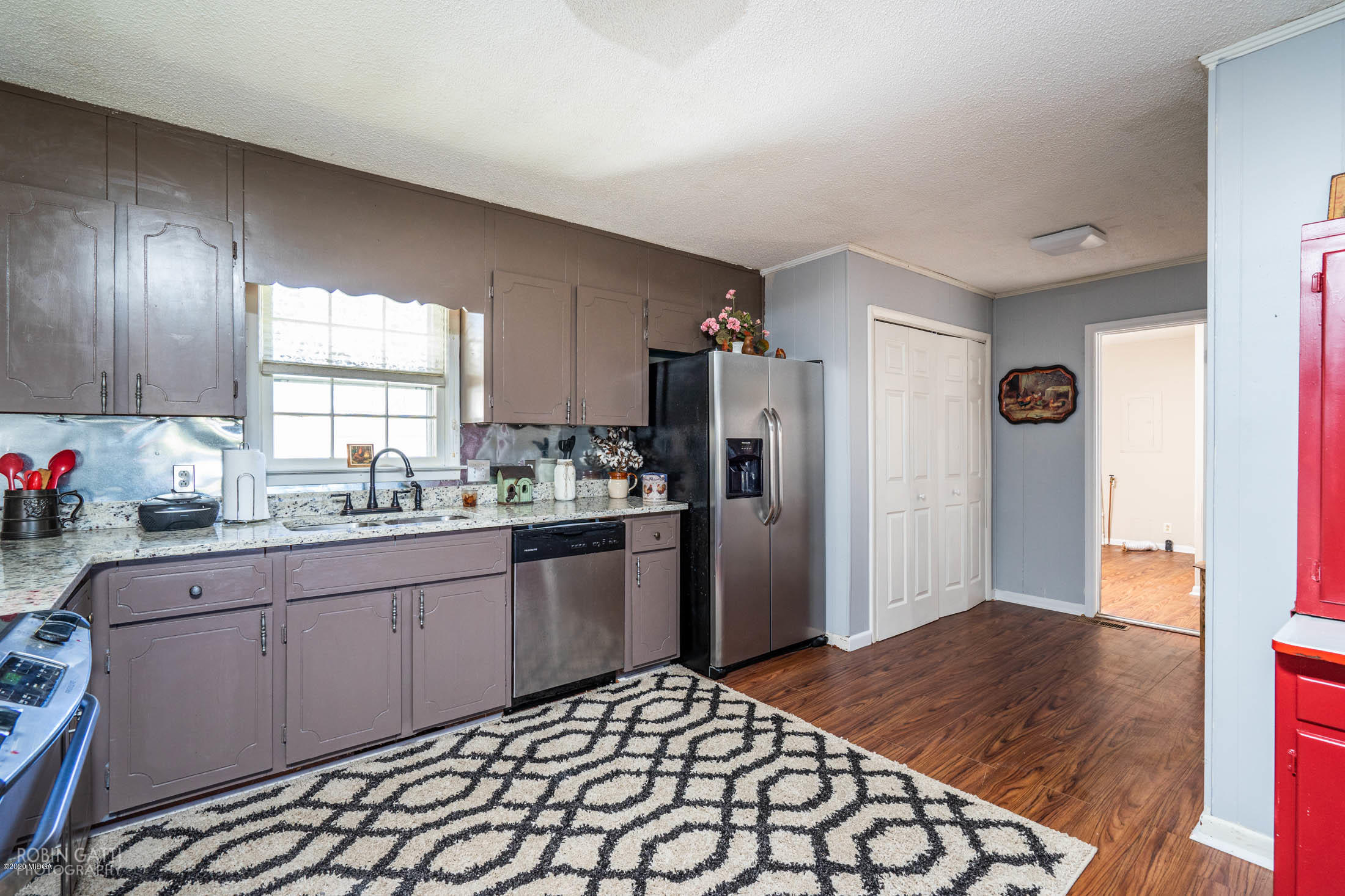 5720 School Road Macon, GA 31216 - Photo 14 of 31 a kitchen with stainless steel appliances granite countertop a refrigerator and a sink