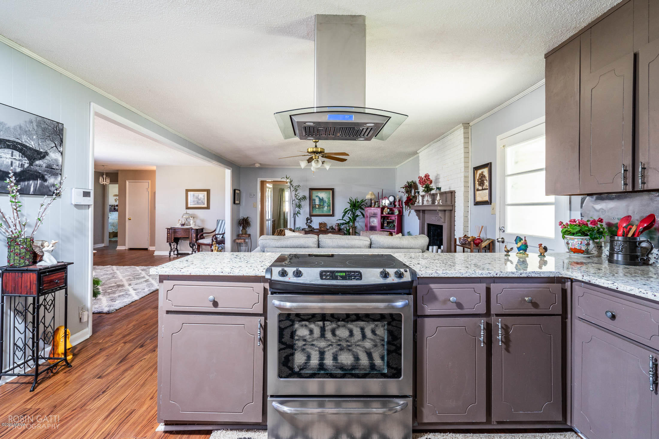 5720 School Road Macon, GA 31216 - Photo 15 of 31 a kitchen with a stove and cabinets