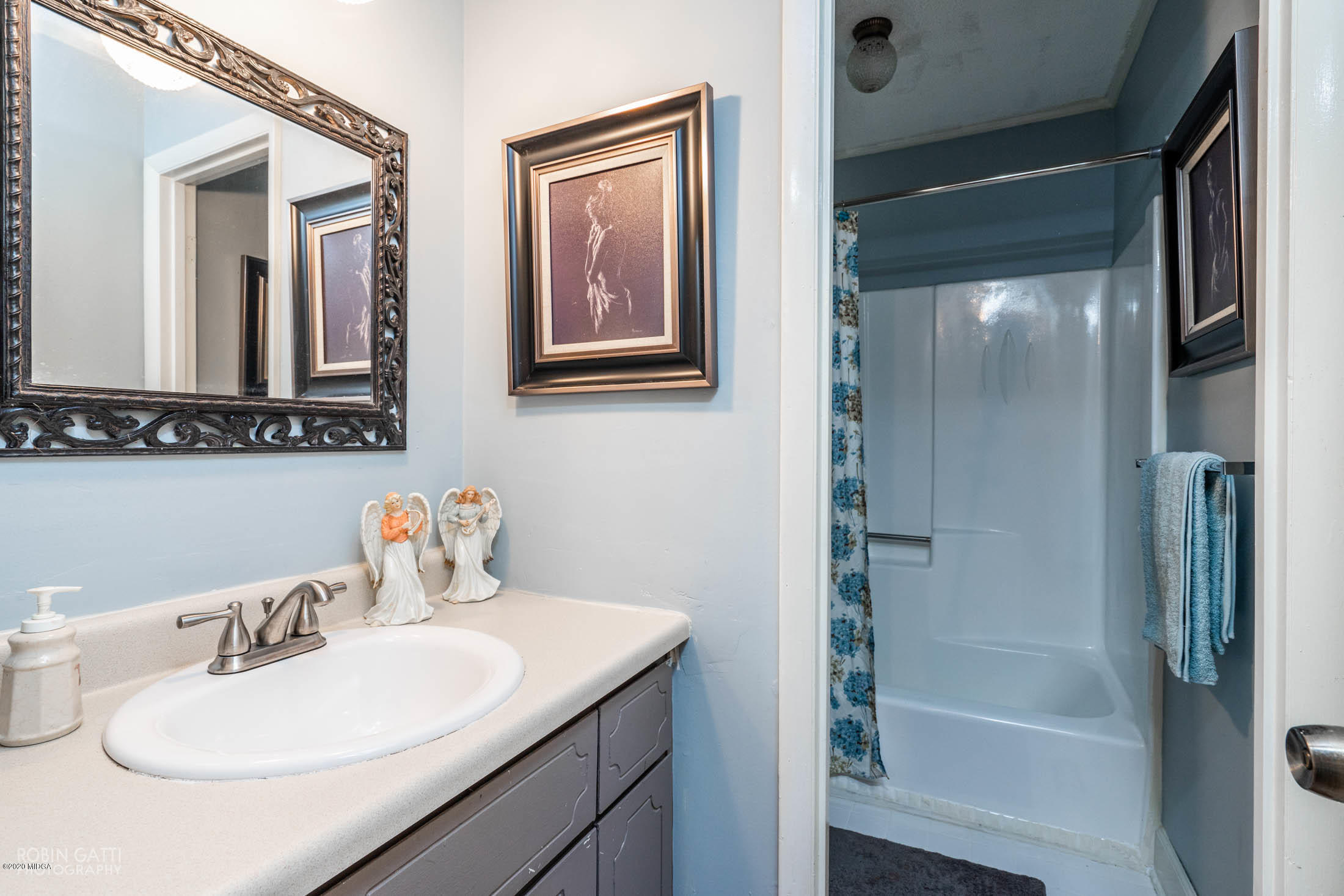 5720 School Road Macon, GA 31216 - Photo 17 of 31 a bathroom with a sink and a mirror