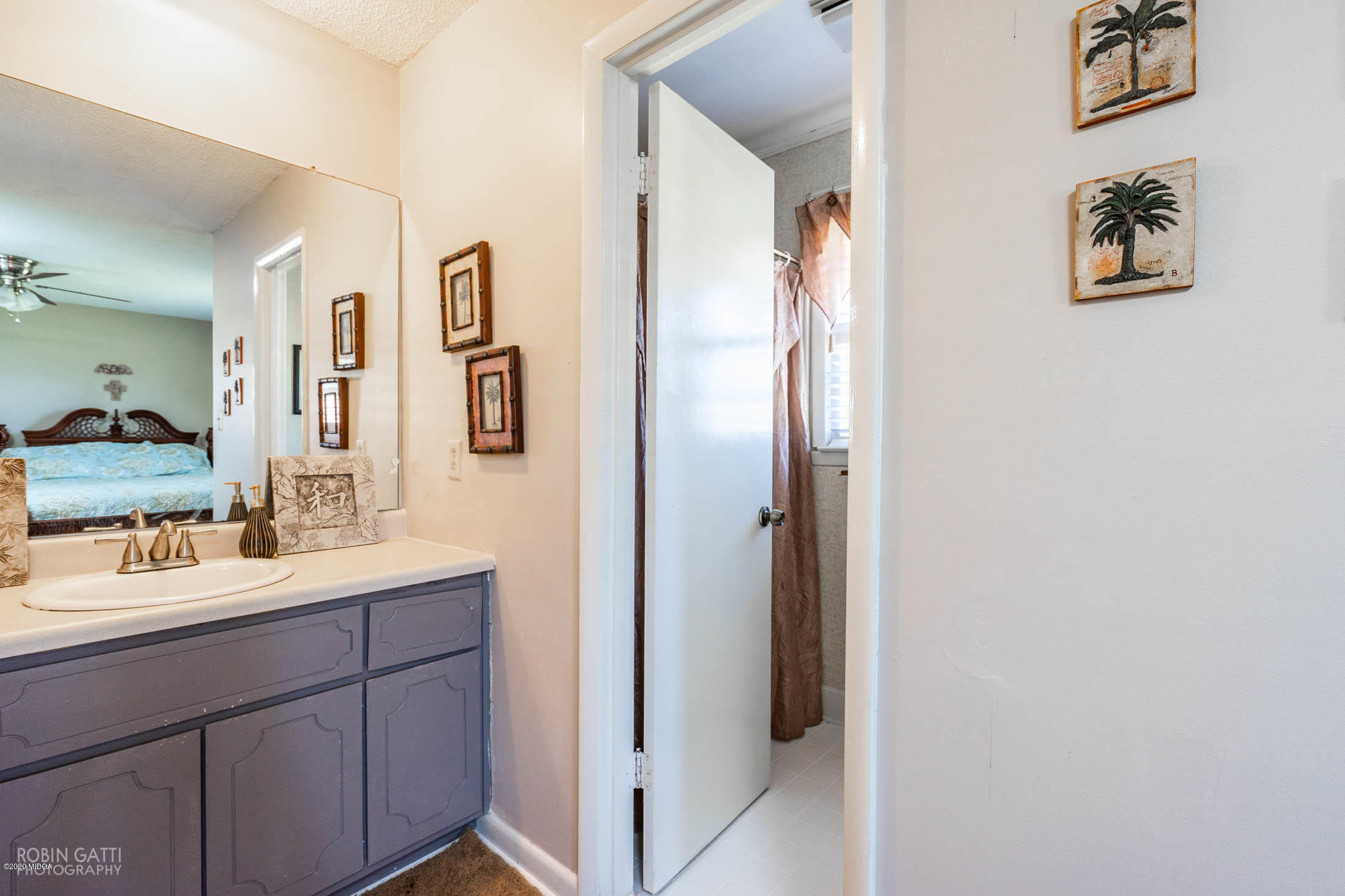 5720 School Road Macon, GA 31216 - Photo 20 of 31 a bathroom with a sink and a mirror