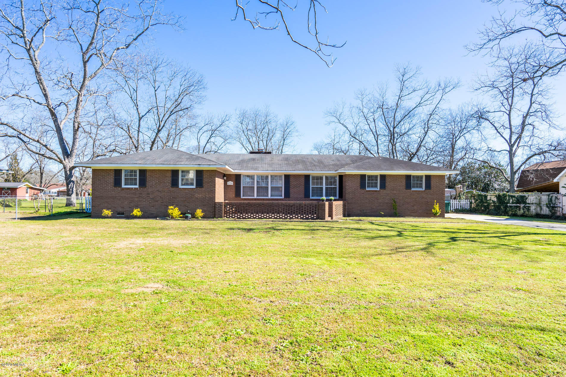 5720 School Road Macon, GA 31216 - Photo 3 of 31 a front view of a house with swimming pool
