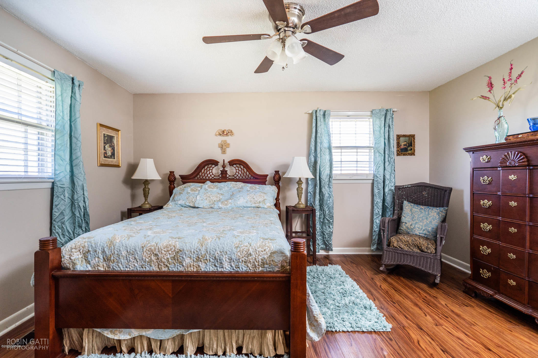5720 School Road Macon, GA 31216 - Photo 22 of 31 a bedroom with a bed and wooden floor