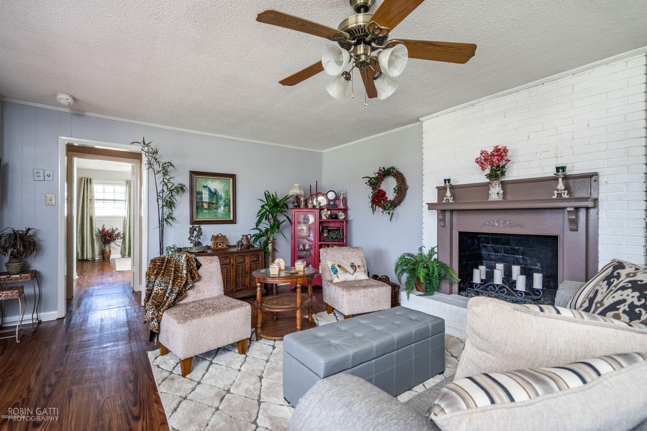 5720 School Road Macon, GA 31216 - Photo 7 of 31 a living room with furniture and a fireplace