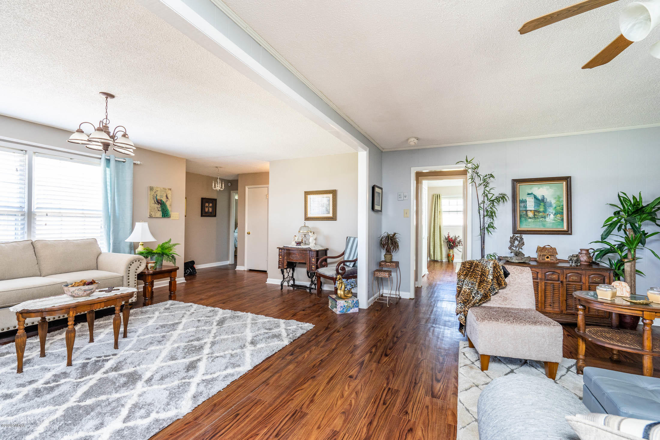 5720 School Road Macon, GA 31216 - Photo 8 of 31 a living room with furniture and wooden floor
