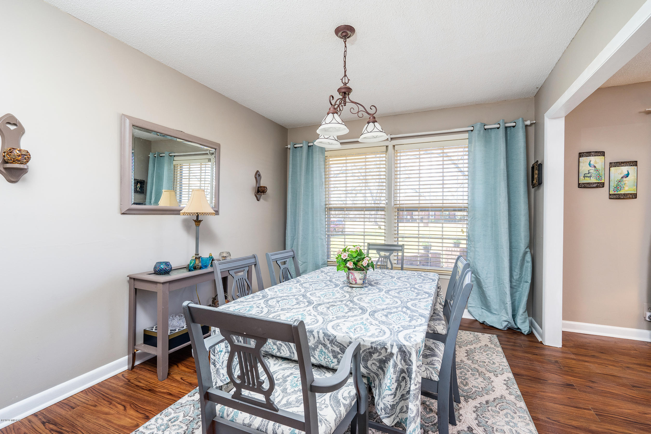 5720 School Road Macon, GA 31216 - Photo 10 of 31 a view of a dining room with furniture window and wooden floor