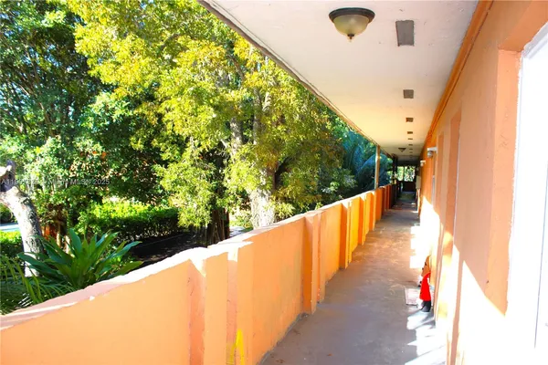 a view of a pathway of a wooden deck