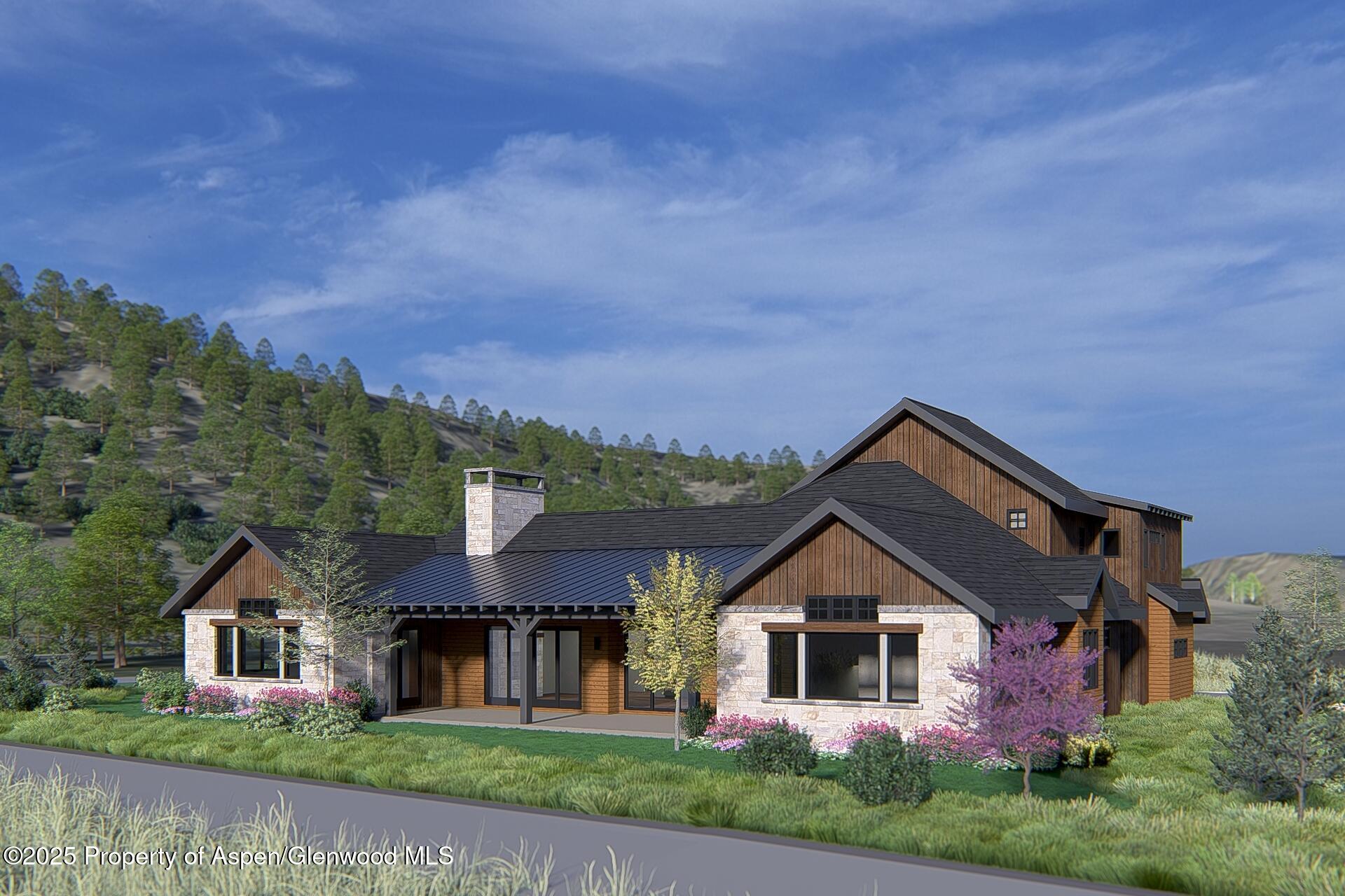 860 Perry Ridge Carbondale, CO 81623 - Photo 11 of 17 front view of a house with a yard