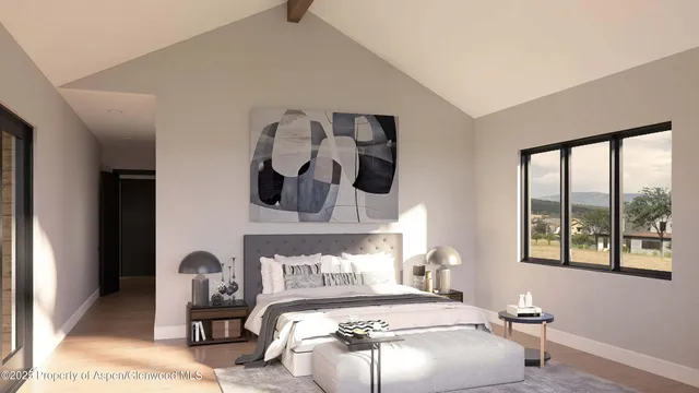 a bedroom with furniture and a window