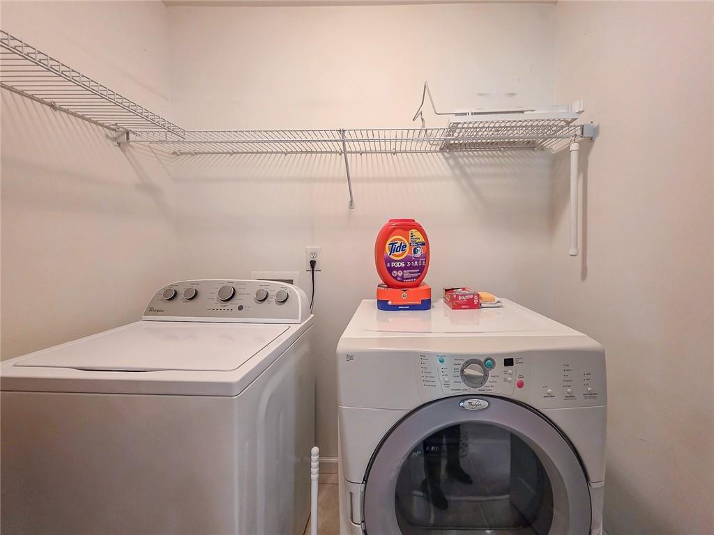 43 Ivy Mist Lane Acworth, GA 30101 - Photo 26 of 58 a utility room with dryer and washer