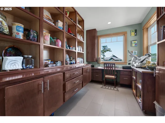 a room with furniture window and book shelf