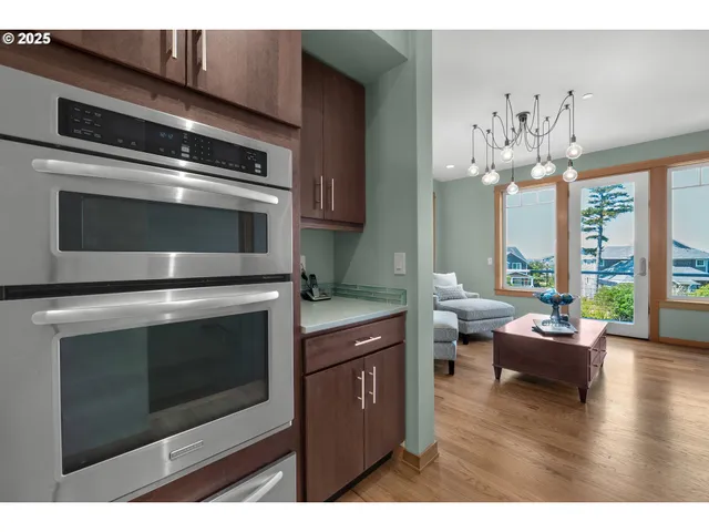 a kitchen with a stove and a microwave