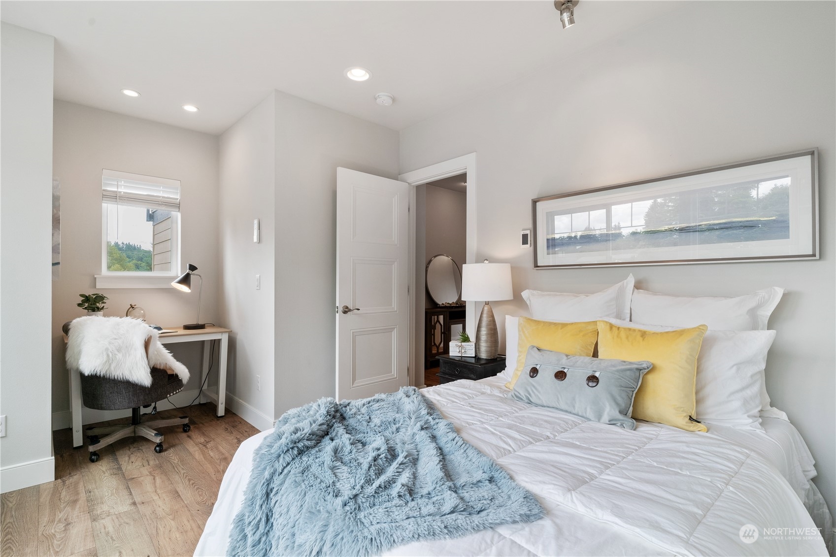 18613 103rd Avenue Northeast Bothell, WA 98011 - Photo 20 of 35 a bedroom with a bed and a chair in it