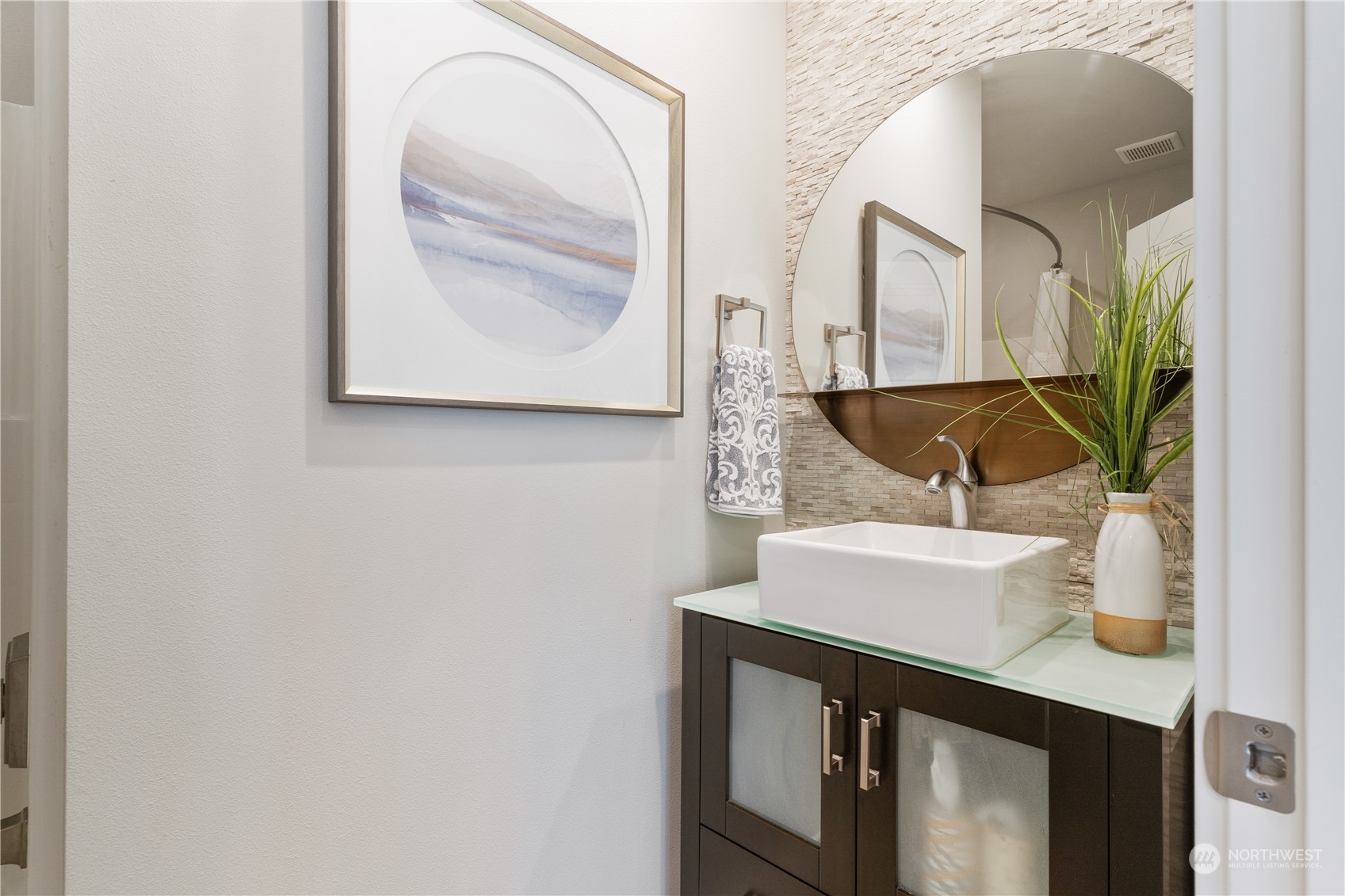 18613 103rd Avenue Northeast Bothell, WA 98011 - Photo 21 of 35 a bathroom with a sink and a mirror