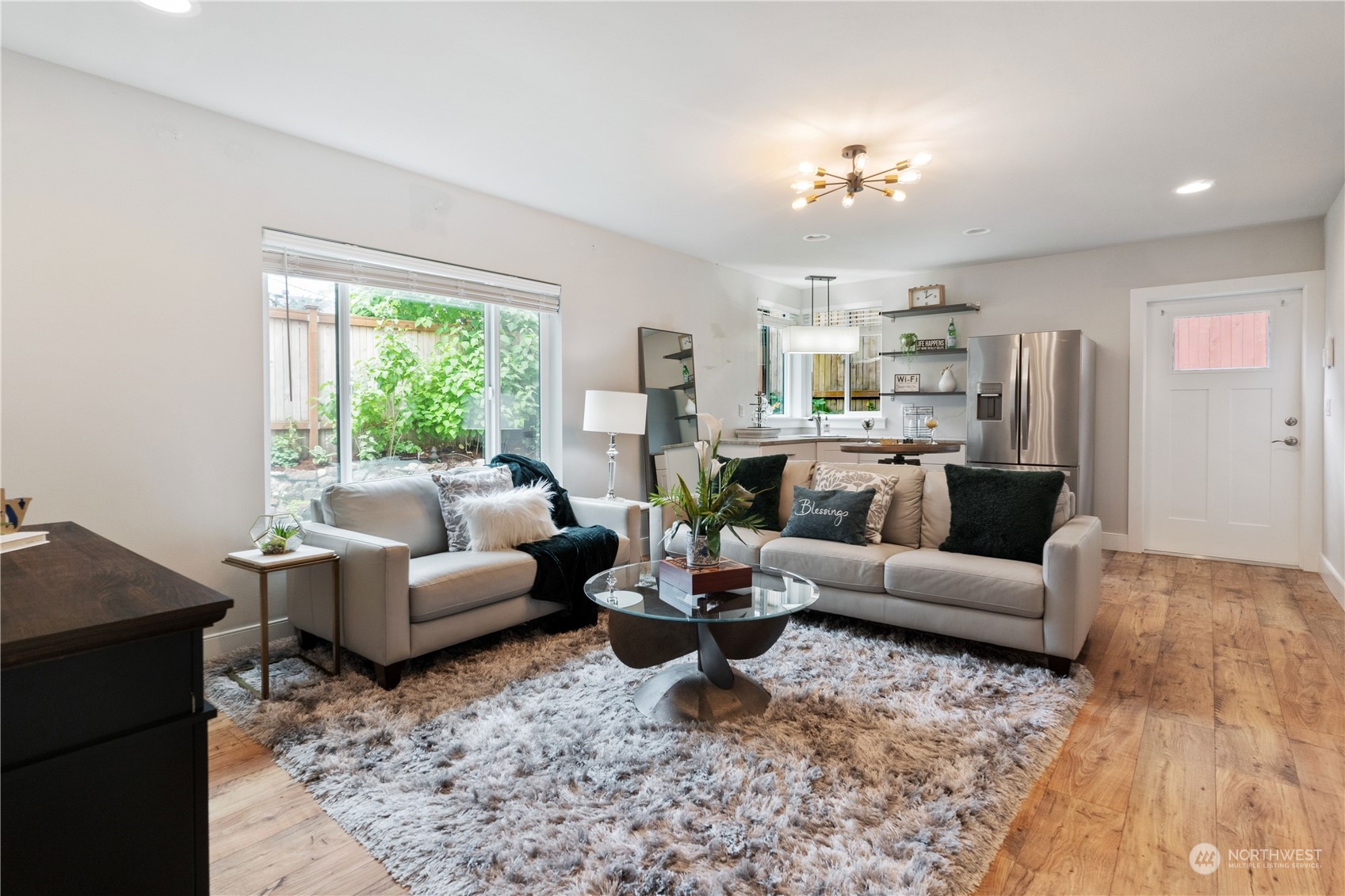 18613 103rd Avenue Northeast Bothell, WA 98011 - Photo 26 of 35 a living room with furniture and a large window