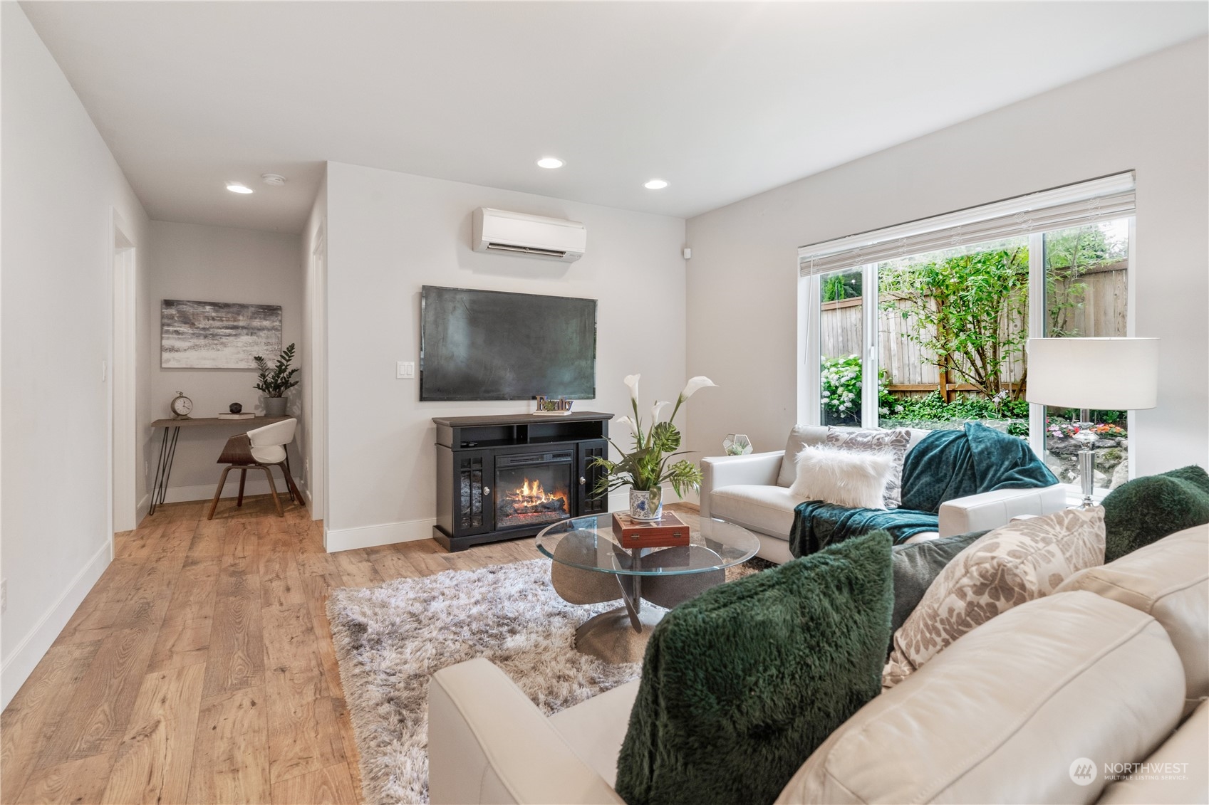 18613 103rd Avenue Northeast Bothell, WA 98011 - Photo 27 of 35 a living room with furniture and a flat screen tv