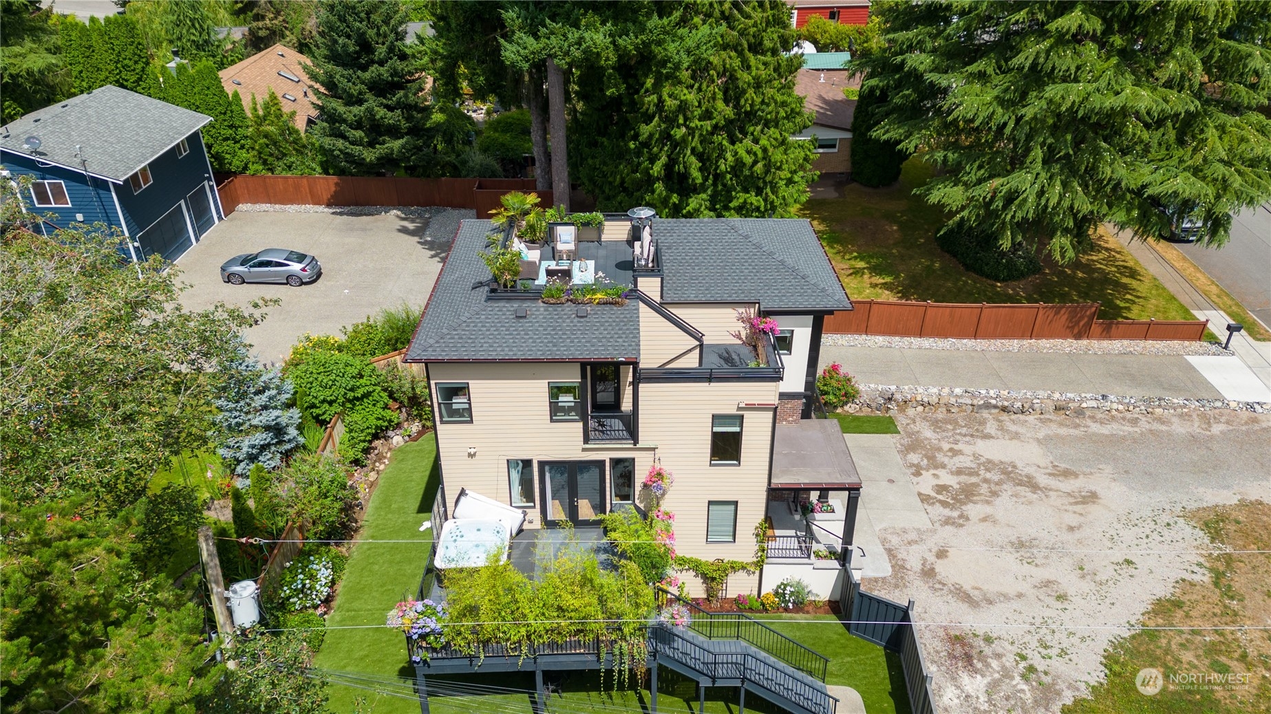 18613 103rd Avenue Northeast Bothell, WA 98011 - Photo 32 of 35 an aerial view of a house with yard swimming pool and outdoor seating