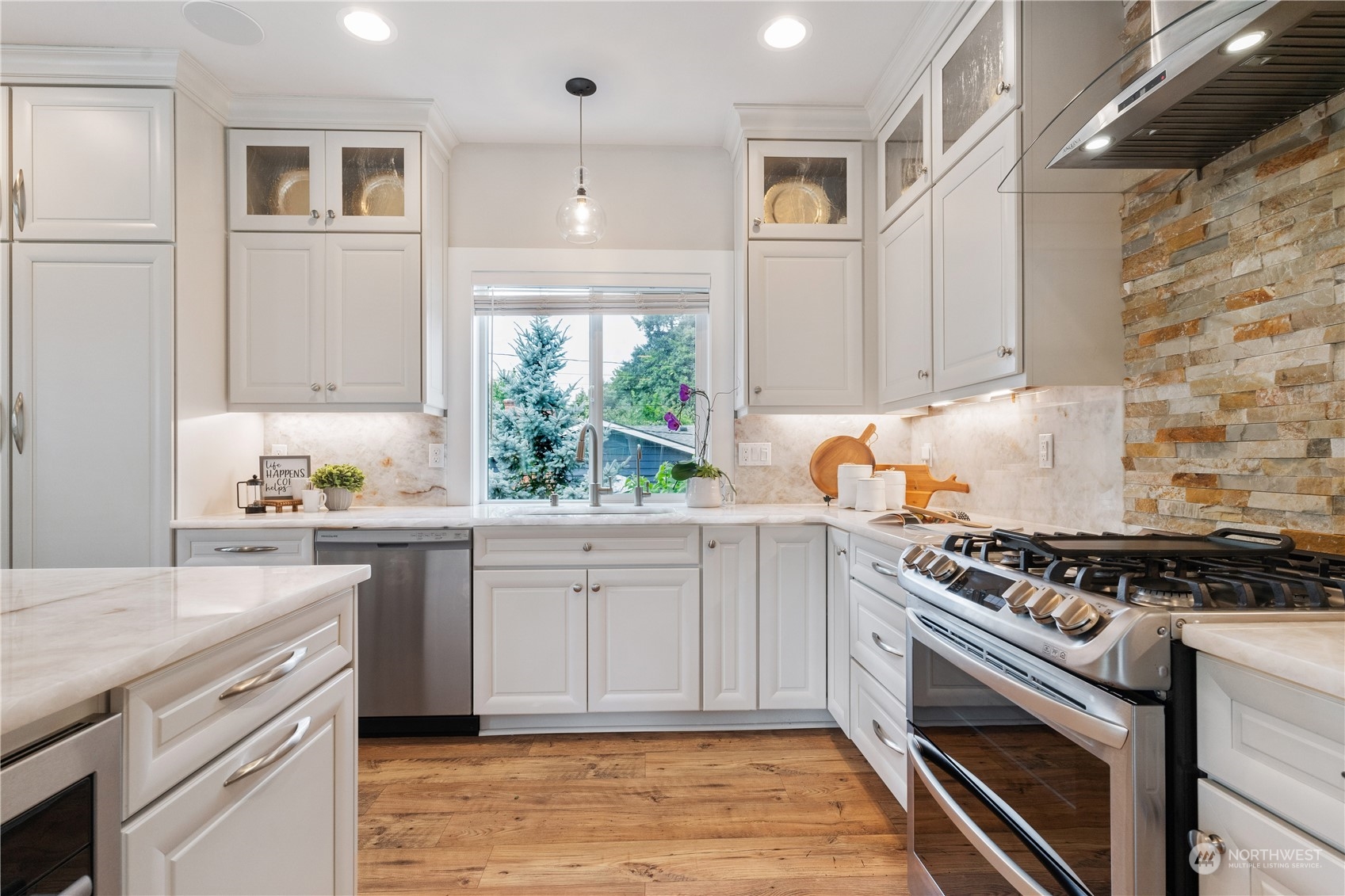 18613 103rd Avenue Northeast Bothell, WA 98011 - Photo 9 of 35 a kitchen with white cabinets and appliances