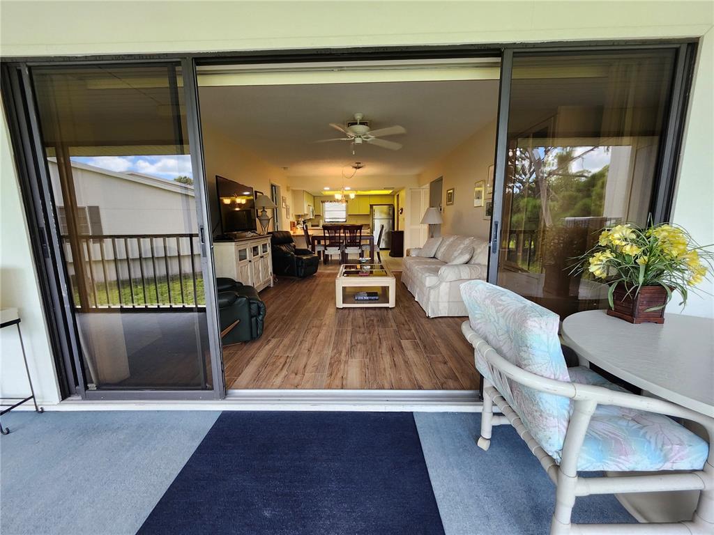 4260 Placida Road, Unit 21D Englewood, FL 34224 - Photo 16 of 38 a view of a living room and dining room