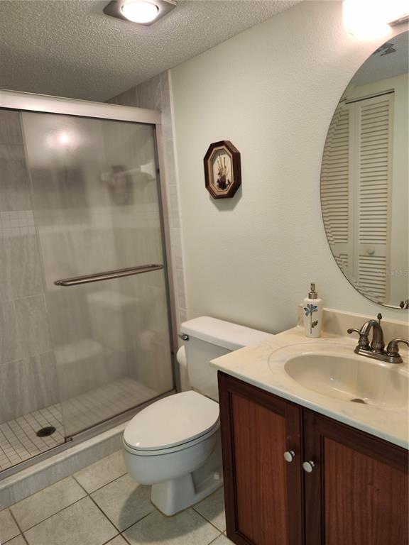 4260 Placida Road, Unit 21D Englewood, FL 34224 - Photo 22 of 38 a bathroom with a sink and a mirror