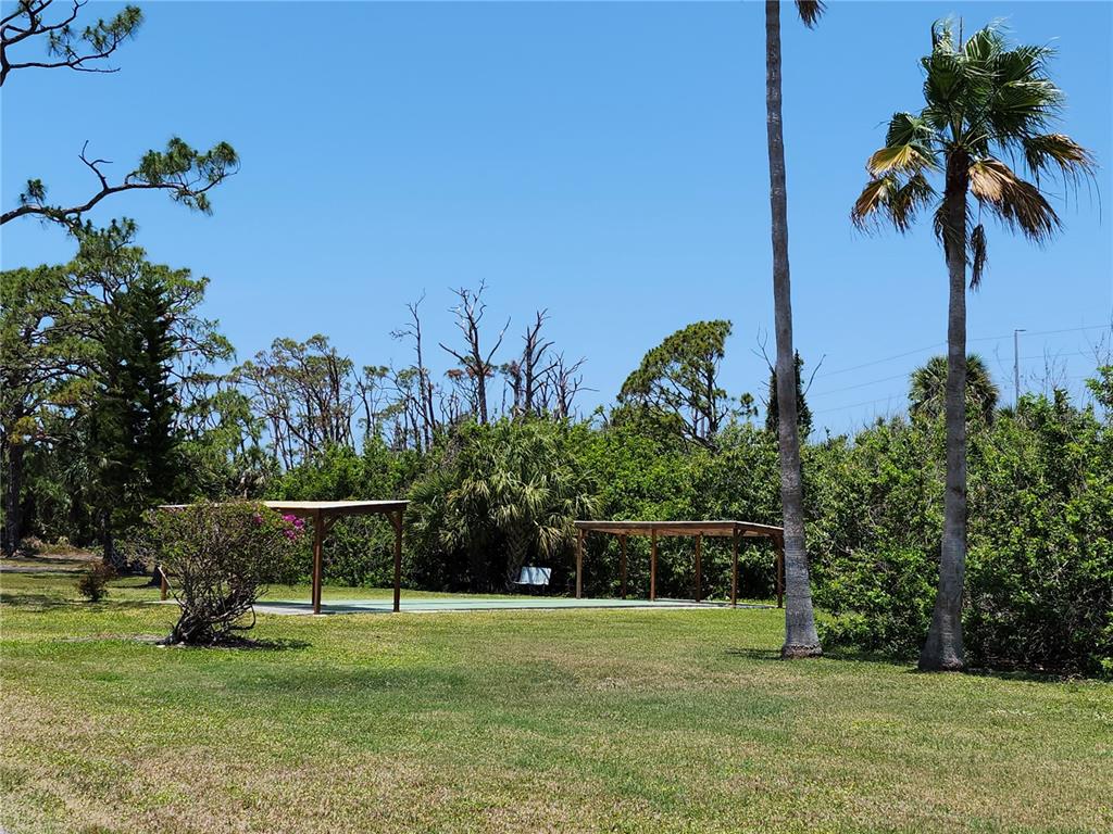 4260 Placida Road, Unit 21D Englewood, FL 34224 - Photo 35 of 38 a view of a garden