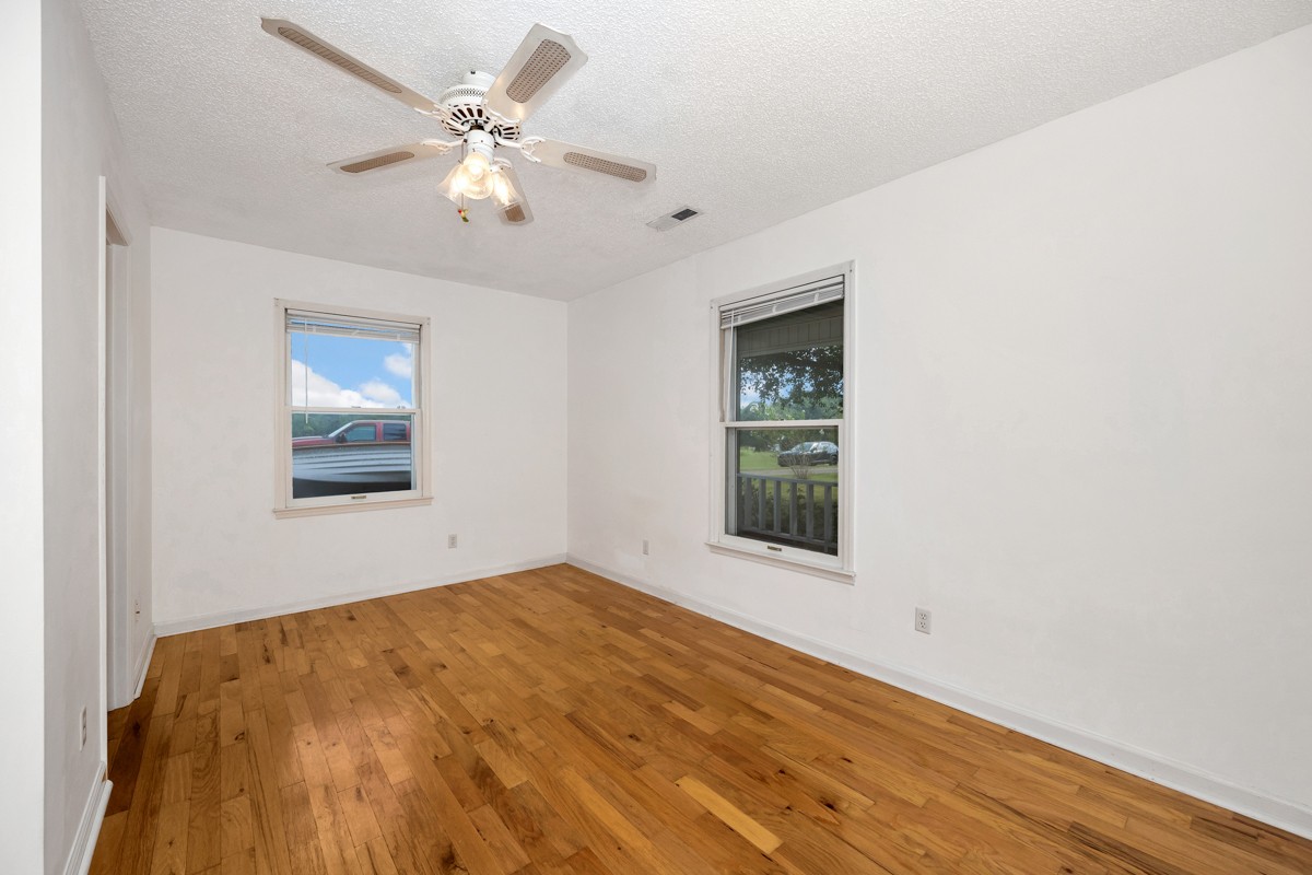 81 Slaughter Pen Road Ardmore, TN 38449 - Photo 12 of 63 a view of an empty room with window