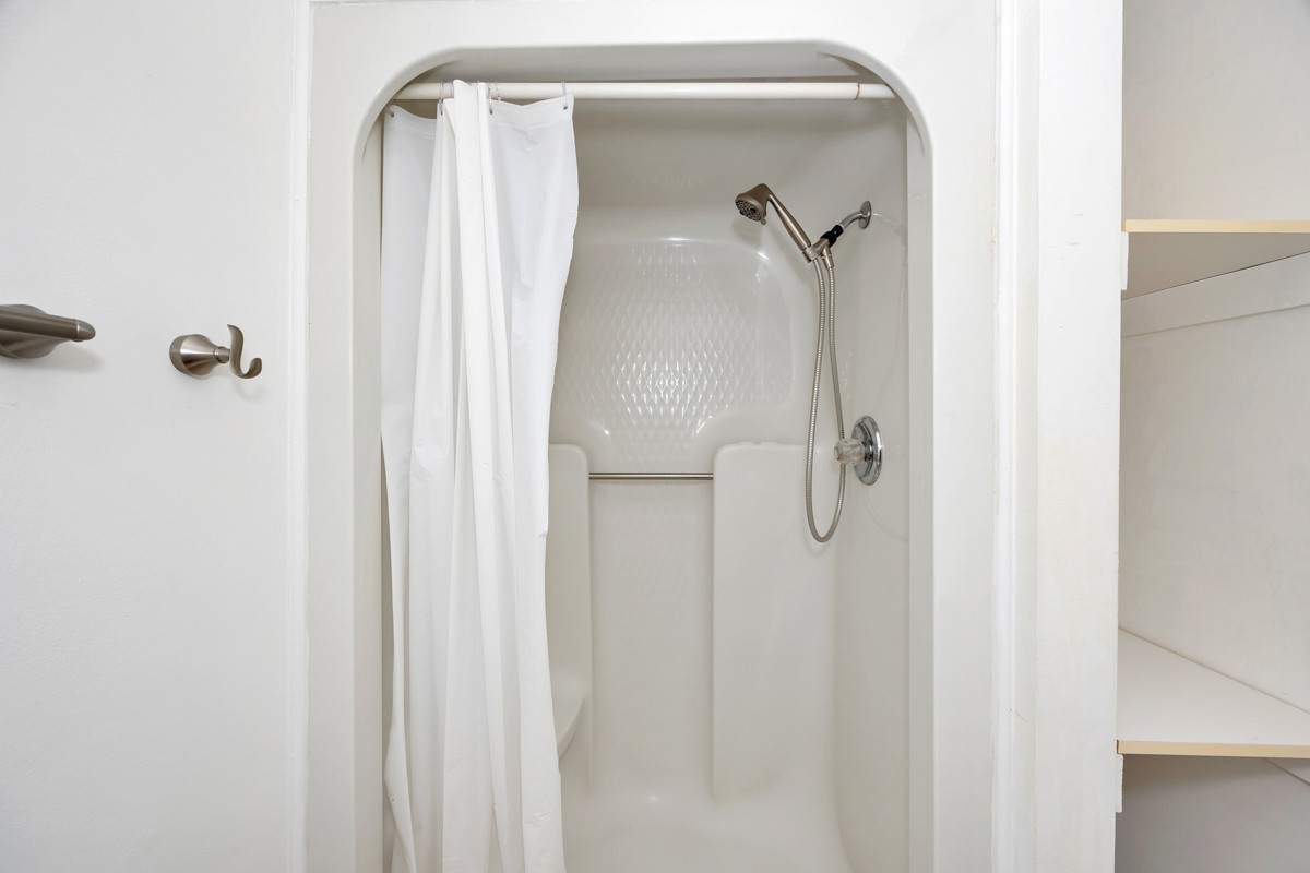 81 Slaughter Pen Road Ardmore, TN 38449 - Photo 14 of 63 a bathroom with a shower